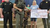 Palm Cay residents make donation in memory of K-9