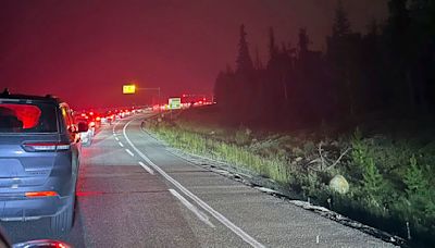 Famed national park evacuated in Canada as fires threaten the area