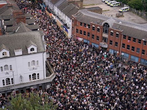 UK riots live: Police braced for 20 'gatherings' tonight after suspects' homes raided