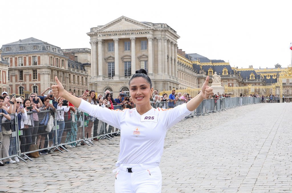 Salma Hayek Got Hyped For Her Olympic Torch Relay Run in Paris By Blasting ‘Lose Yourself,’ Naturally