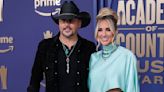 Jason Aldean plants a kiss on wife Brittany at the 2024 ACM Awards