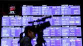 Asia shares nudge higher as US, EU inflation data loom