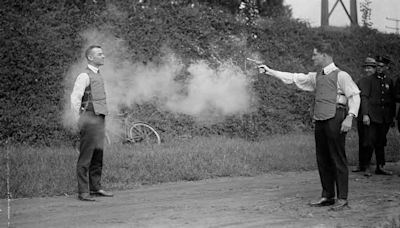 Authentic 1923 Picture of Men Demonstrating Bulletproof Vest?