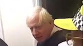 Boris Johnson caught on video during early morning police raid of stunned rapper’s home