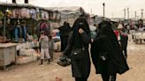 US brings home 11 Americans held in Syrian refugee camp for ISIS families