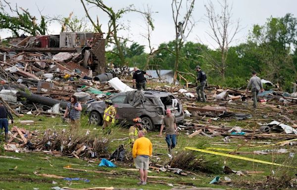 Tornado-spawning storms left multiple people dead in Iowa and are now threatening cities from Texas to Vermont