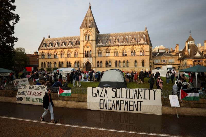 With bright tents and sombre mood, protesting UK students show solidarity with US peers