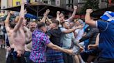 Scotland fans won't let terrible weather ruin Euros as they dance in the rain