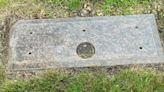 Brass nameplate stolen from headstone; vases taken from same cemetery