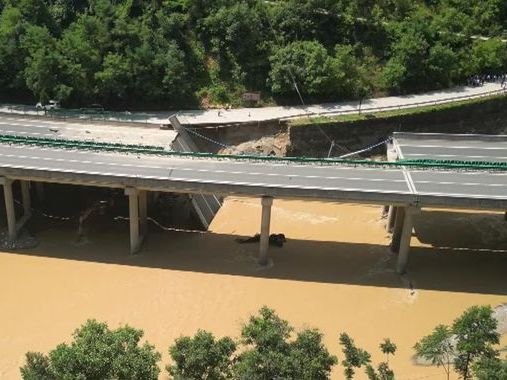 China bridge collapse: Desperate search for 30 people still missing - but time has surely run out