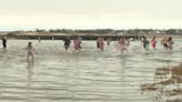 Some Islanders kick off 2024 with a dip in the ocean