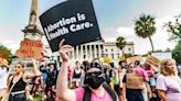 A South Carolina woman was forced to leave the state for an abortion. Now, she's suing