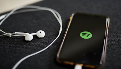 Spotify's Q2 paid subscribers rise 12% to 246 million; clocks record quarterly profit