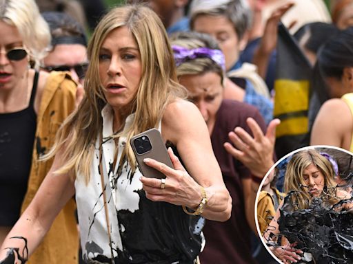 Jennifer Aniston gets fake oil thrown at her while filming ‘The Morning Show’: set photos