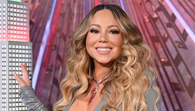 La última excentricidad de Mariah Carey: fotografiada con su peluquero en el parque de atracciones