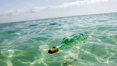 Four die after drinking from bottles found in sea