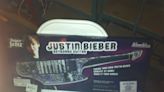 Weird and wonderful items left after UK gigs: including a signed Justin Bieber keytar