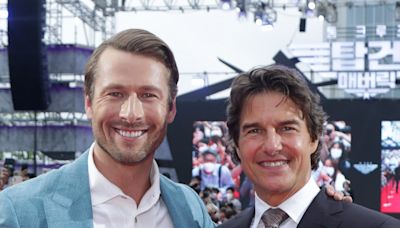 Tom Cruise supports friend and Top Gun: Maverick co-star Glen Powell at Twisters premiere