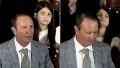 Louisiana gov fails to notice girl fainting behind him as he signs bill requiring Ten Commandments in schools