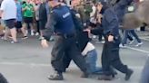 Man dragged through streets by gardai as Ireland and England fans clash