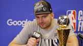 Luka Doncic made the funniest face when Mavericks VP Michael Finley stole a beer from him