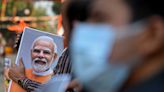 Arrests made after thousands of anti-Modi posters appear across Delhi