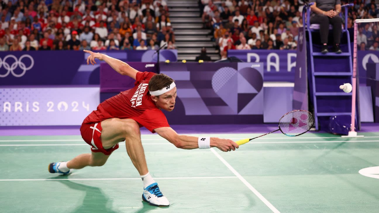 Denmark's Axelsen defends badminton gold title
