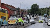 Busy Liverpool road closed after Mercedes smashes into traffic lights