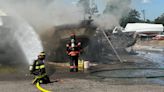 Crews working to put out boat fire at Wayne County marina