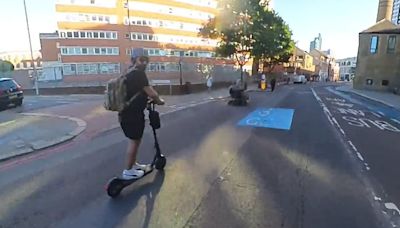 Moment e-scooter driver nearly collides with wheelchair user