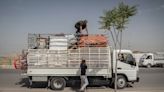 The closure of camps in Iraq housing Yazidis displaced by IS attacks is postponed, an official says