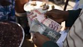 Ghana’s Cedi Weakens Into Historic Decline Versus the Dollar