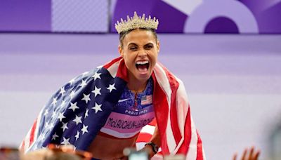 Former Kentucky star Sydney McLaughlin-Levrone breaks own world record for Olympic gold