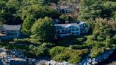 Killer view? Oak trees that marred harbor vista from wealthy Missouri couple’s Maine home mysteriously felled.