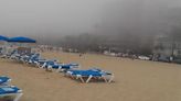 Video shows Benidorm beach disappearing in 'bizarre' fog leaving Brit tourists fuming