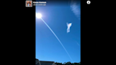 ‘My hands were shaking.’ Odd cloud resembling an angel seen over South Carolina yard