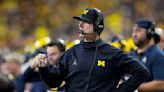 Michigan gets 3 years of probation for football recruiting violations; case vs. Jim Harbaugh pending