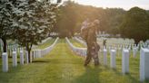 US Army soldiers place flags on Arlington National Cemetery gravesites in annual tradition