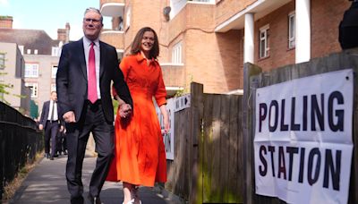 Sunak and Starmer cast their ballots as voting under way in high-stakes poll