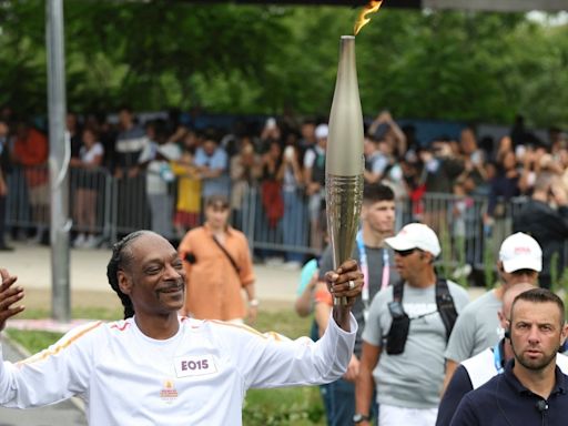 Paris Olympics 2024: Snoop Dogg stars as flame sails into Paris for opening ceremony