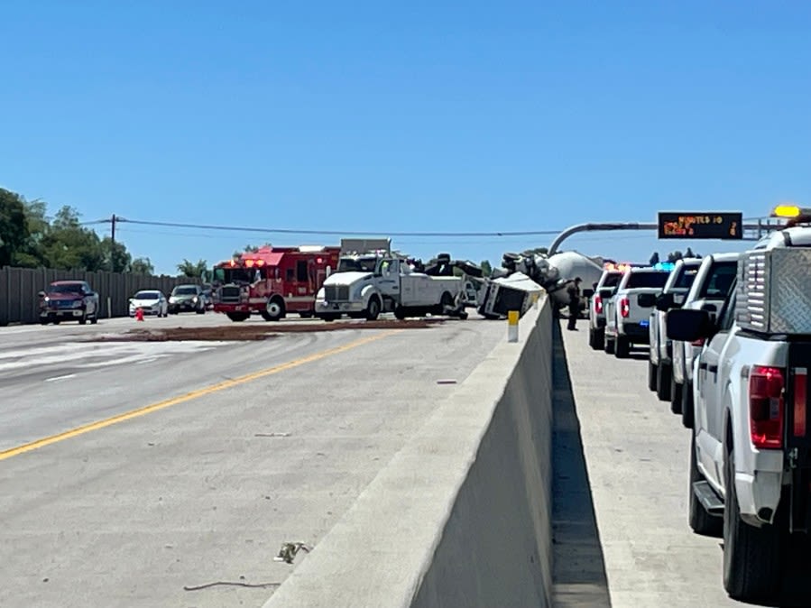 Heavy delays hit I-125 after cement truck rolls onto barricade in Taylorsville