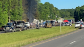 Double tractor-trailer crash kills one, closes part of Hwy 77