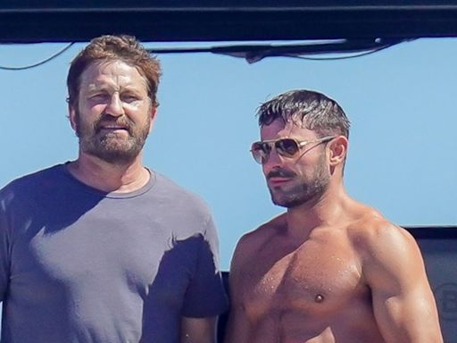 Gerard Butler e Zac Efron curtem passeio de iate ao lado de mulheres e amigos