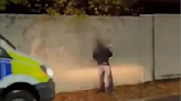 Manchester police officer filmed 'pulling down posters of Hamas hostages'