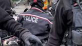 Video appears to show officer with knee on protestor's neck, police say it didn't happen