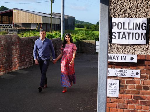 Sunak and Starmer cast their ballots as voting under way in high-stakes poll