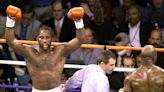 Lewis beat Holyfield to become undisputed but action of his opponent stunned him