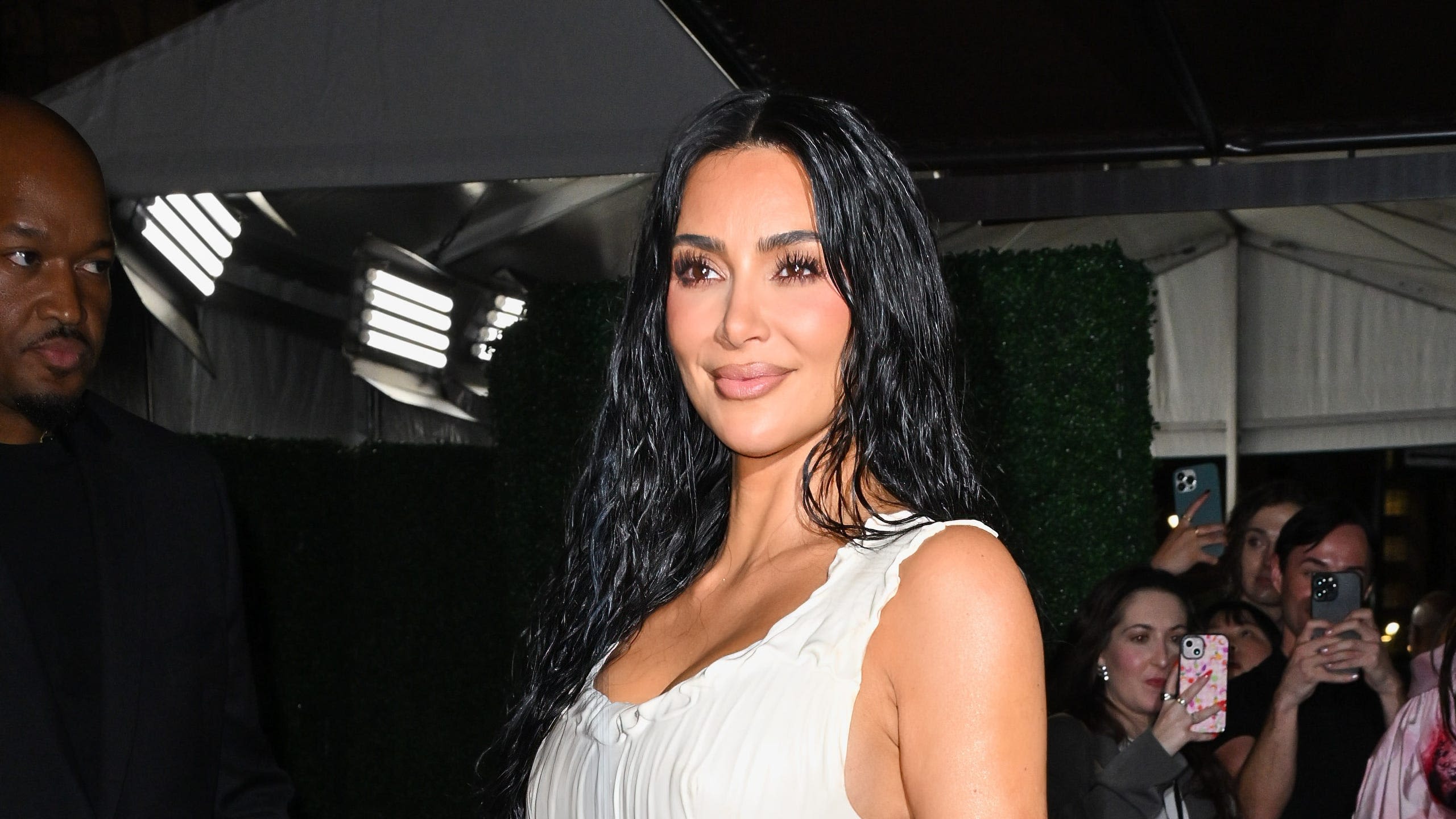 Kim Kardashian Shares Selfies in Vinyl Plunging Top