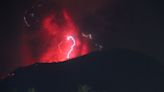 Indonesia’s Mount Ibu erupts 3 times, spewing lava and clouds of grey ash