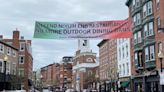 North End restaurants send message with protesting banners over streets